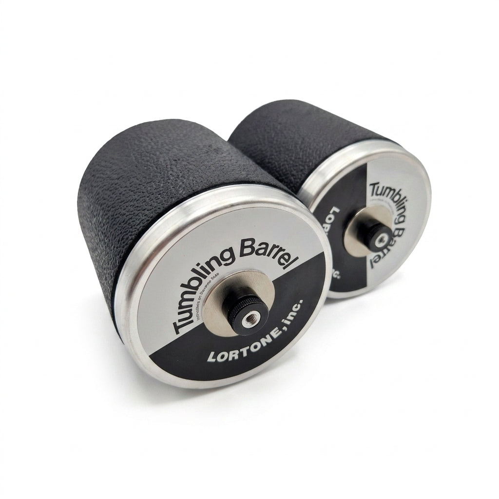 Two black and silver tumbling barrels with 'Tumbling Barrel' branding on a white background.